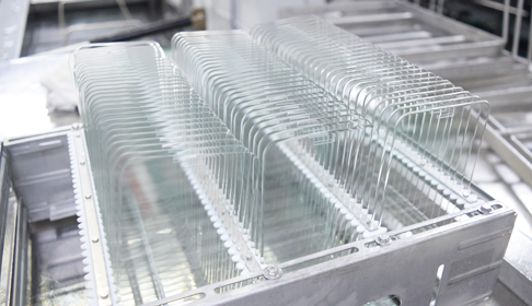 镀膜玻璃使用平板清洗机出现滚轮印的解决方法